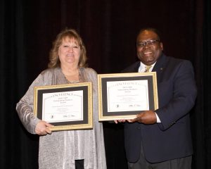 Toni Gunderman accepts the Overall State CAPP District Awards for Rogers Group, Inc. Interstate Sand & Gravel and Rogers Group, Inc. Morgan County Sand & Gravel